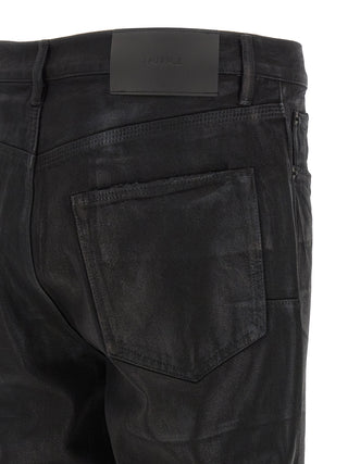 Jeans acampanados de algodón negro