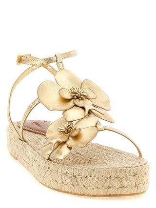 Sandalias planas doradas de cuero