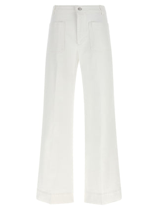 Jeans acampanados de algodón blanco