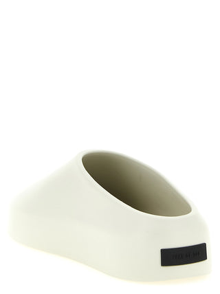 Zuecos de acetato beige