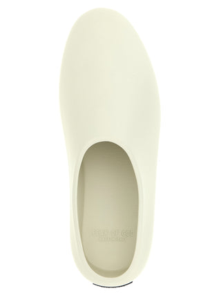 Zuecos de acetato beige