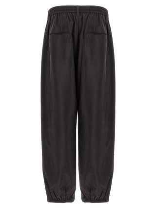 Pantalones deportivos de seda marrón