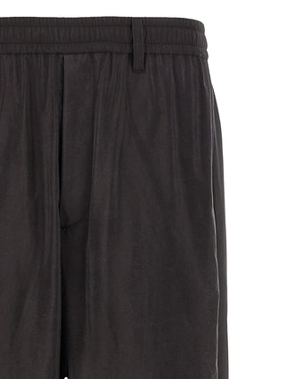 Pantalones deportivos de seda marrón