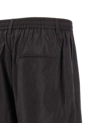Pantalones deportivos de seda marrón