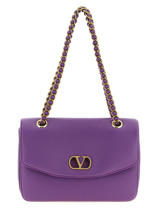Bolso de hombro morado de piel de cordero