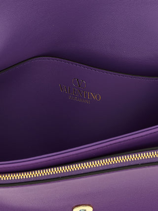 Bolso de hombro morado de piel de cordero