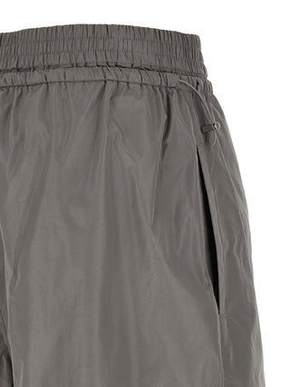 Pantalones deportivos de poliéster gris