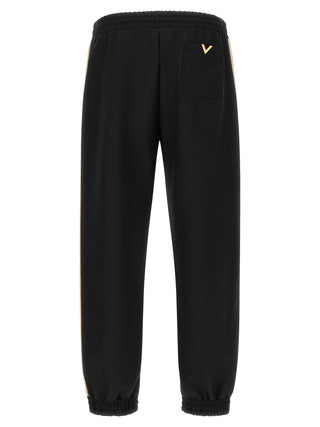 Pantalones deportivos negros de poliéster