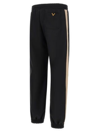 Pantalones deportivos negros de poliéster