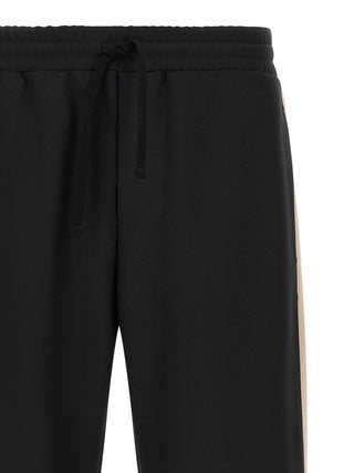 Pantalones deportivos negros de poliéster