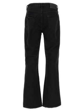 Jeans acampanados de algodón negro