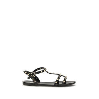 Sandalias planas de goma negras