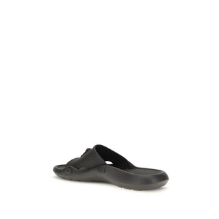Sandalias negras de goma
