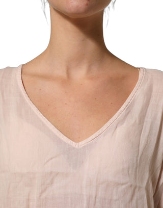 Blusa top rosa claro de lino con cuello en V y mangas largas