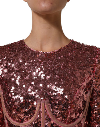 Vestido largo rosa con corsé y detalles de lentejuelas