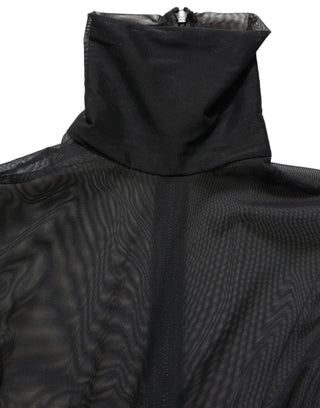 Mono vestido de malla transparente negra con cuello alto