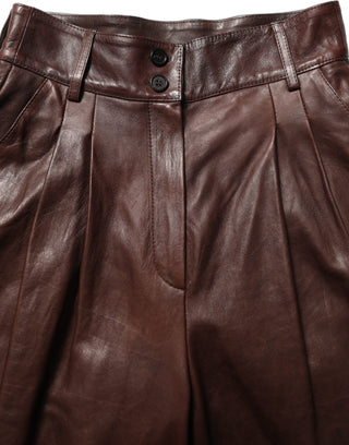 Pantalones marrones de cuero de cintura alta con pierna cónica