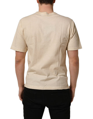 Camiseta beige de algodón con estampado gráfico y cuello redondo