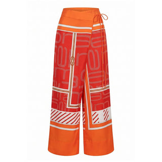 Pantalón naranja de seda para mujer