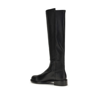 Botas marrones de piel de becerro Bos Taurus por encima de la rodilla