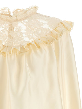 Blusa de seda beige
