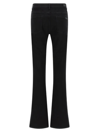 Jeans negros de algodón con corte acampanado