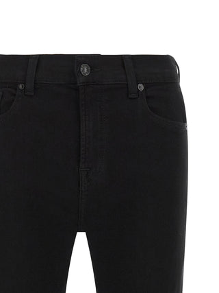 Jeans negros de algodón con corte acampanado