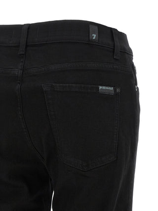 Jeans negros de algodón con corte acampanado