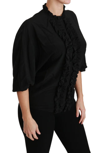 Blusa de seda negra con camisa y volantes
