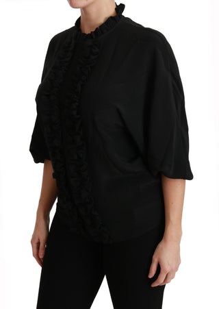 Blusa de seda negra con camisa y volantes