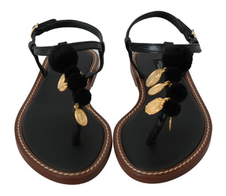 Schwarze Leder-Flip-Flops mit Münzapplikation