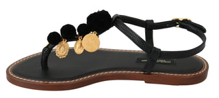 Schwarze Leder-Flip-Flops mit Münzapplikation