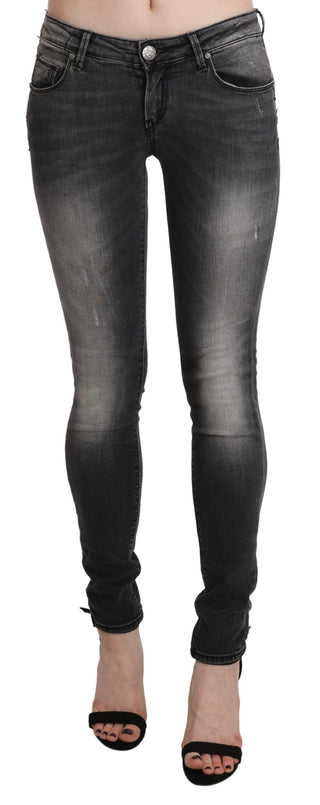 Jeans de algodón ajustados de cintura baja negros desgastados