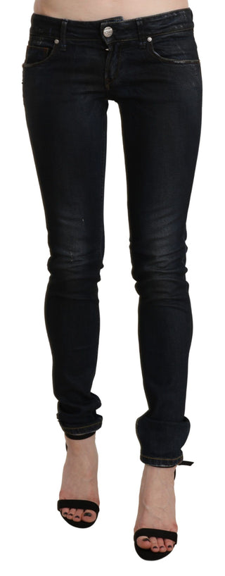 Jeans de mezclilla ajustados de cintura baja negros desgastados