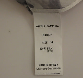 Graublaue ärmellose Seidenbluse