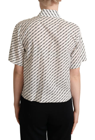 Blusa de lunares blanca con cuello