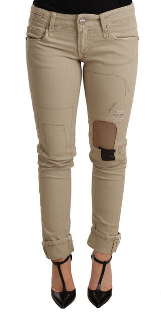 Pantalones de algodón denim beige slim fit con dobladillo