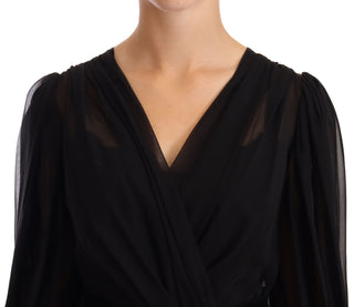 Schwarzes, plissiertes Mini-Kleid aus Seiden-Stretch mit Netzstoff-Einsätzen