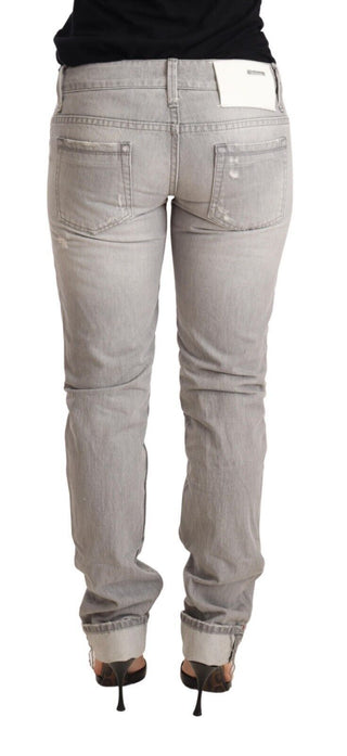 Graue zerrissene Baumwoll-Denim-Jeans mit schmalem Schnitt und umgeschlagenem Saum für Damen