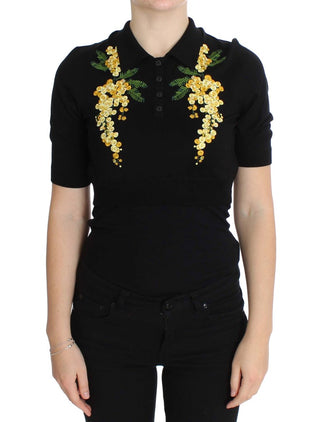 Top de polo de seda negra con bordado floral