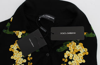 Top de polo de seda negra con bordado floral