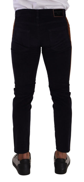 Jeans de pana elástica ajustados de algodón azul