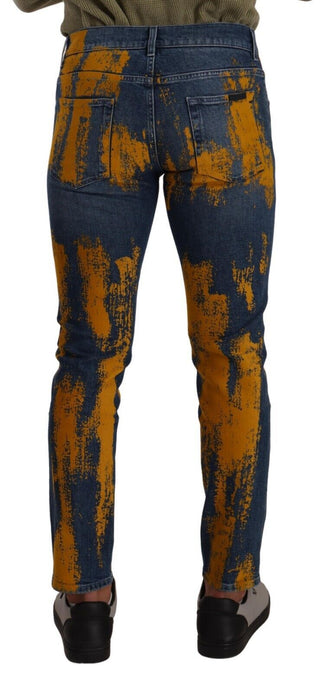Jeans de mezclilla ajustados de algodón azul y amarillo