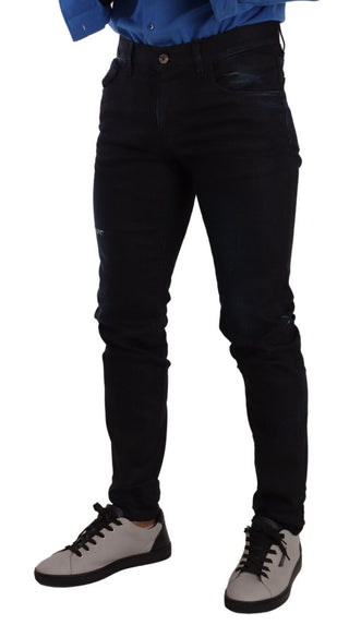 Jeans de mezclilla elásticos ajustados de algodón azul