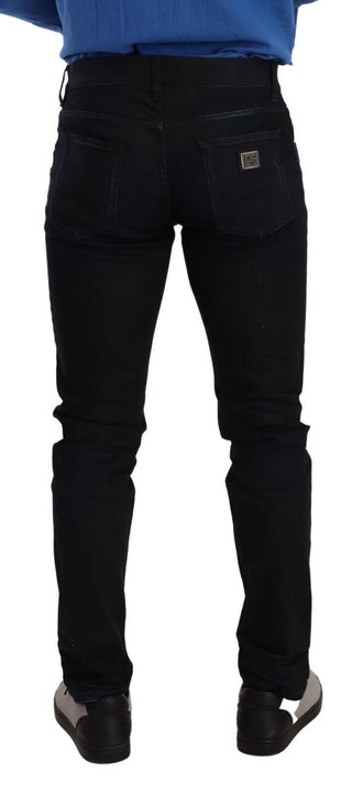 Jeans de mezclilla elásticos ajustados de algodón azul