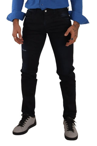 Jeans de mezclilla elásticos ajustados de algodón azul