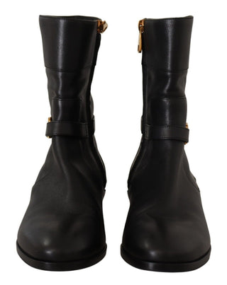 Schwarze Leder-Ballerinas mit Logo und kurzen Stiefeln