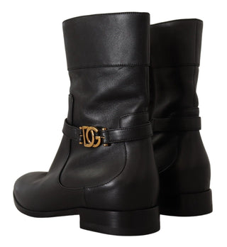 Schwarze Leder-Ballerinas mit Logo und kurzen Stiefeln