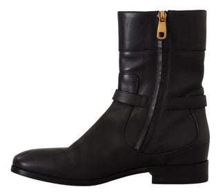 Schwarze Leder-Ballerinas mit Logo und kurzen Stiefeln