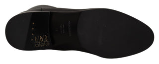 Schwarze Leder-Ballerinas mit Logo und kurzen Stiefeln